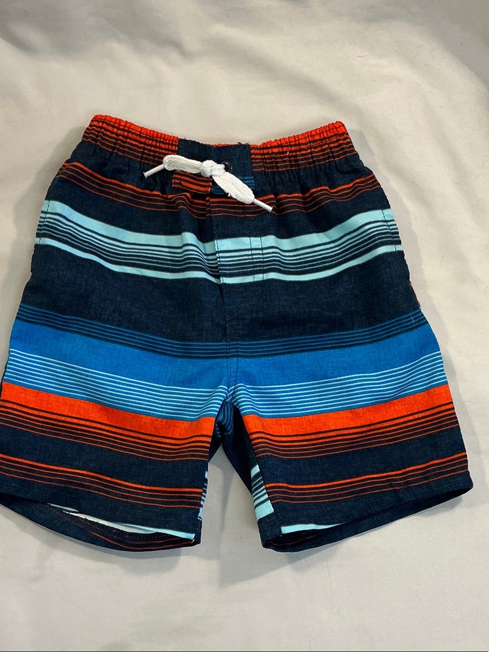 Calvin Klein Jeans Boys Striped Swim Shorts in Navy, Blue & Orange